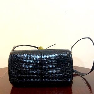 Luc Benoit Shoulder bag